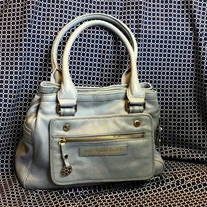 Marc Jacobs Handbag with Unique Magnetic Closures